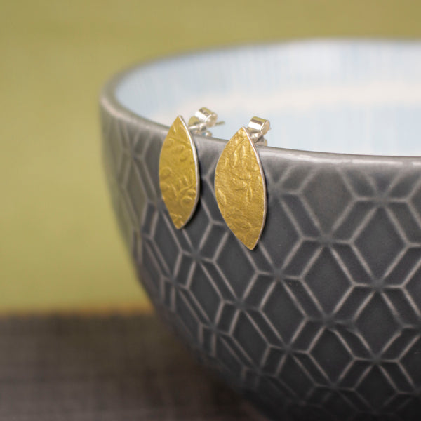 24k gold and silver leaf patterned petal shaped stud earrings by Joanne Tinley Jewellery
