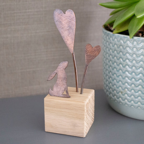hare and hearts ornament handcrafted from copper and oak by Joanne Tinley
