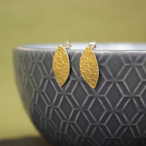 24k gold and silver flower patterned petal shaped stud earrings by Joanne Tinley Jewellery