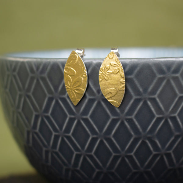 24k gold and silver flower patterned petal shaped stud earrings by Joanne Tinley Jewellery