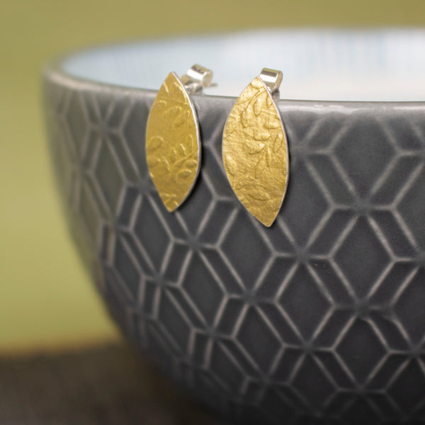 24k gold and silver leaf patterned petal shaped stud earrings by Joanne Tinley Jewellery