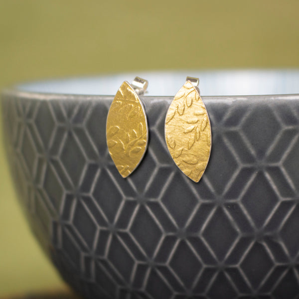 24k gold and silver leaf patterned petal shaped stud earrings by Joanne Tinley Jewellery