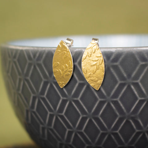 24k gold and silver leaf patterned petal shaped stud earrings by Joanne Tinley Jewellery