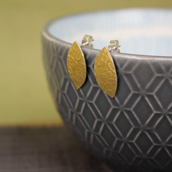 24k gold and silver oak leaf patterned petal shaped stud earrings by Joanne Tinley Jewellery