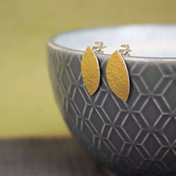 24k gold and silver leaf patterned petal shaped stud earrings by Joanne Tinley Jewellery