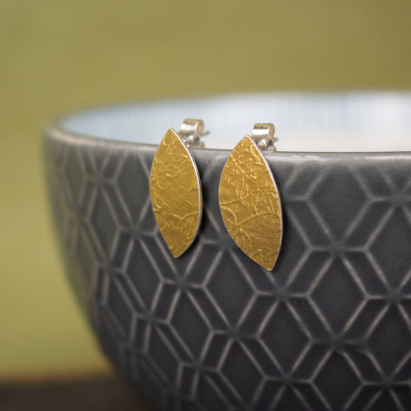 24k gold and silver leaf patterned petal shaped stud earrings by Joanne Tinley Jewellery