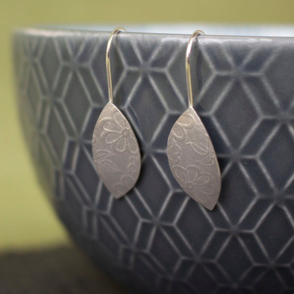 sterling silver petal shaped drop earrings by Joanne Tinley Jewellery