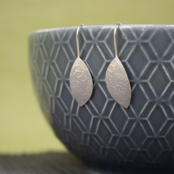 sterling silver petal shaped drop earrings by Joanne Tinley Jewellery