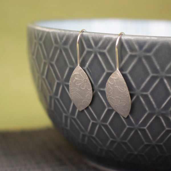 sterling silver petal shaped drop earrings by Joanne Tinley Jewellery
