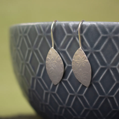 sterling silver petal shaped drop earrings by Joanne Tinley Jewellery