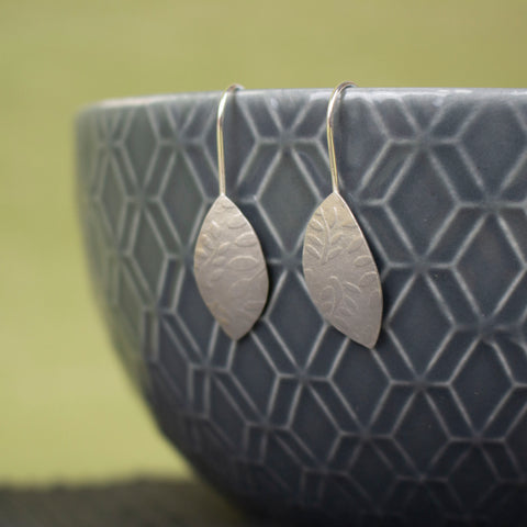 sterling silver petal shaped drop earrings by Joanne Tinley Jewellery