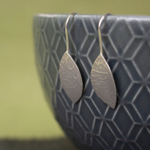 sterling silver petal shaped drop earrings by Joanne Tinley Jewellery