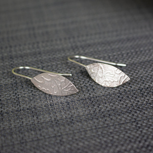 sterling silver petal shaped drop earrings by Joanne Tinley Jewellery
