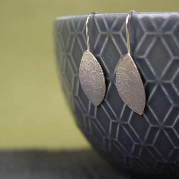 sterling silver petal shaped drop earrings by Joanne Tinley Jewellery