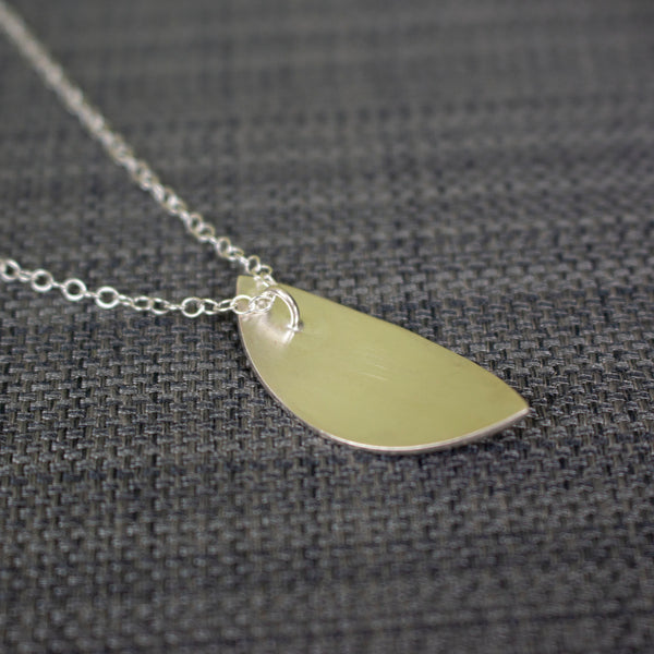 24k gold and silver flower patterned petal shaped pendant by Joanne Tinley Jewellery