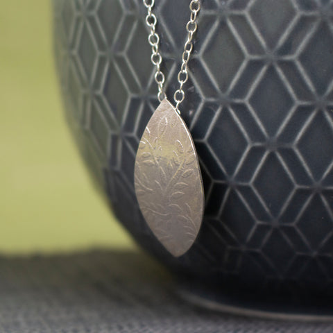 sterling silver petal shaped pendant by Joanne Tinley Jewellery