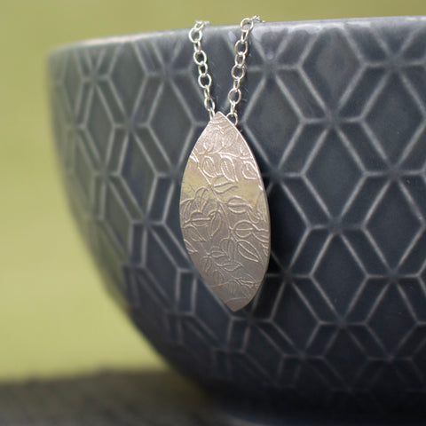 sterling silver petal shaped pendant by Joanne Tinley Jewellery