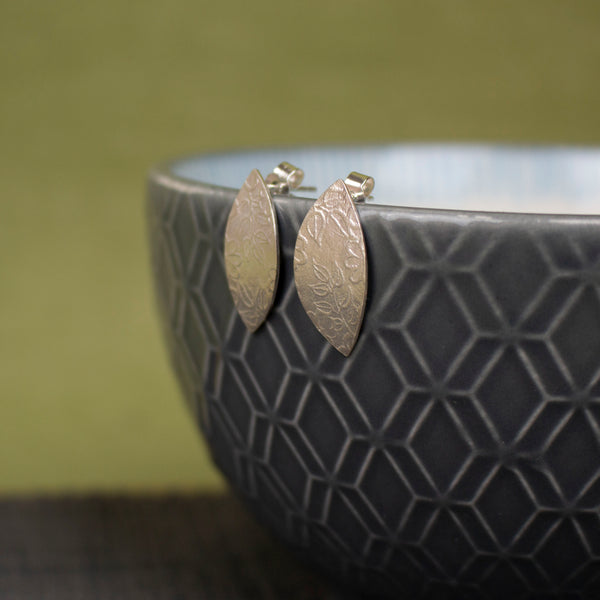 sterling silver petal shaped stud earrings by Joanne Tinley Jewellery