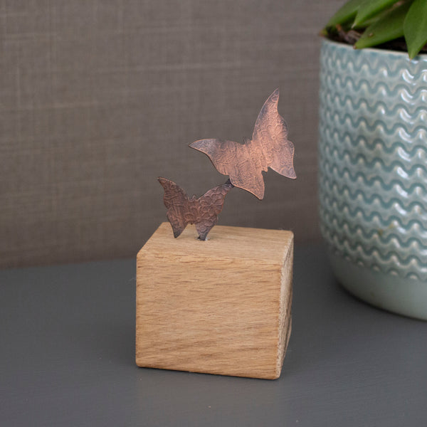 copper and oak ornament featuring two butterflies in flight - Joanne Tinley Jewellery