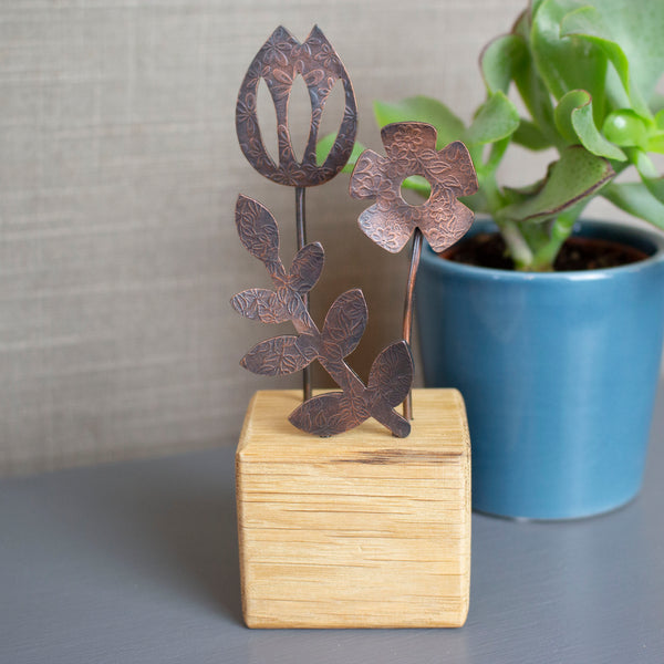tulip,daisy and leaf ornament handcrafted from copper and oak by Joanne Tinley