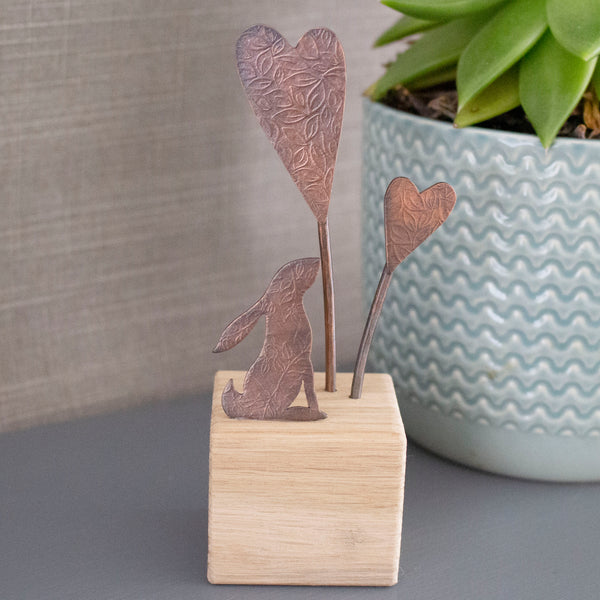 hare and hearts ornament handcrafted from copper and oak by Joanne Tinley