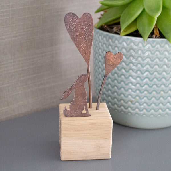 hare and hearts ornament handcrafted from copper and oak by Joanne Tinley