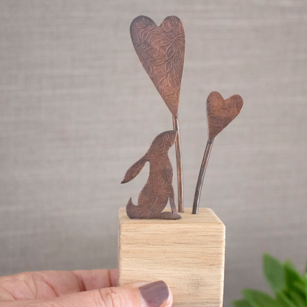 hare and hearts ornament handcrafted from copper and oak by Joanne Tinley