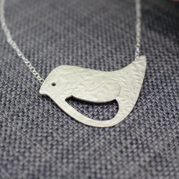 sterling silver bird and leaf necklace at Joanne Tinley Jewellery
