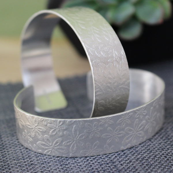 sterling silver flower and leaf cuff bracelet | Joanne Tinley Jewellery | Hampshire