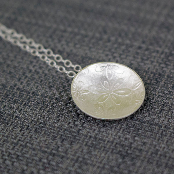 sterling silver flower disc pendant at Joanne Tinley Jewellery