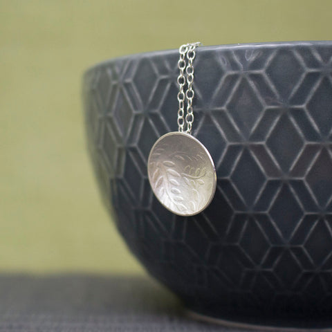 sterling silver leaves disc pendant at Joanne Tinley Jewellery