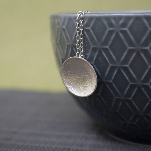 sterling silver leaves disc pendant at Joanne Tinley Jewellery
