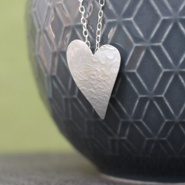 sterling silver flower heart pendant at Joanne Tinley Jewellery