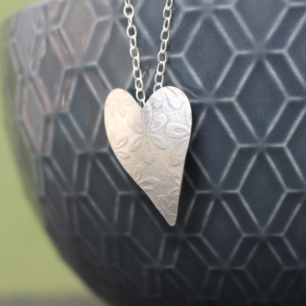 sterling silver flower heart pendant at Joanne Tinley Jewellery