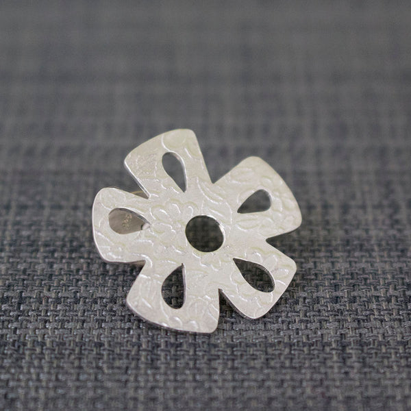 sterling silver daisy pin at Joanne Tinley Jewellery